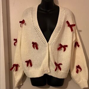 Elegant Cream Cardigan with Red Bow Accents